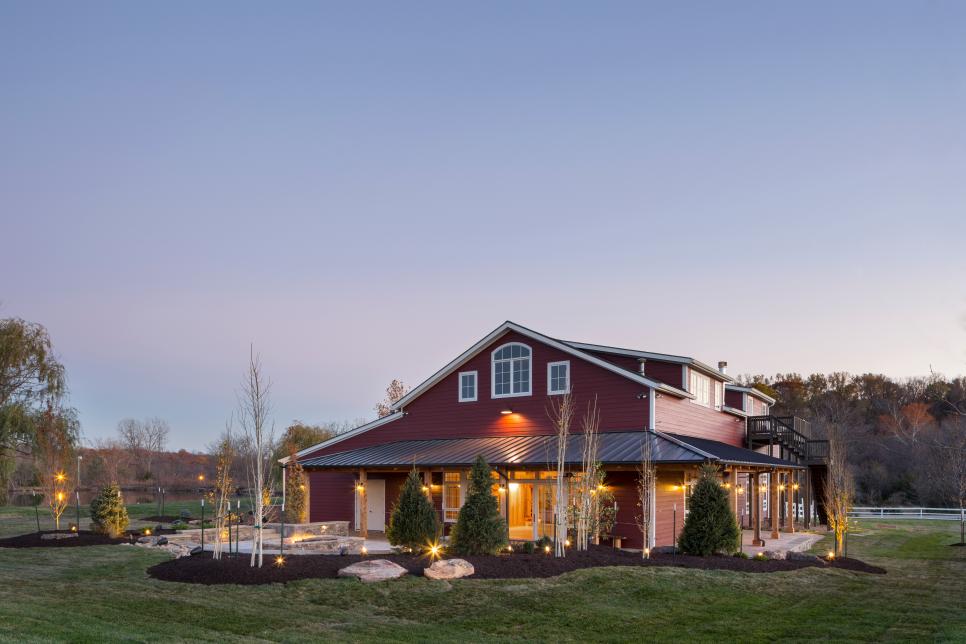An exterior view of the red party barn designed by Kevin Transue of CHC Design Build.